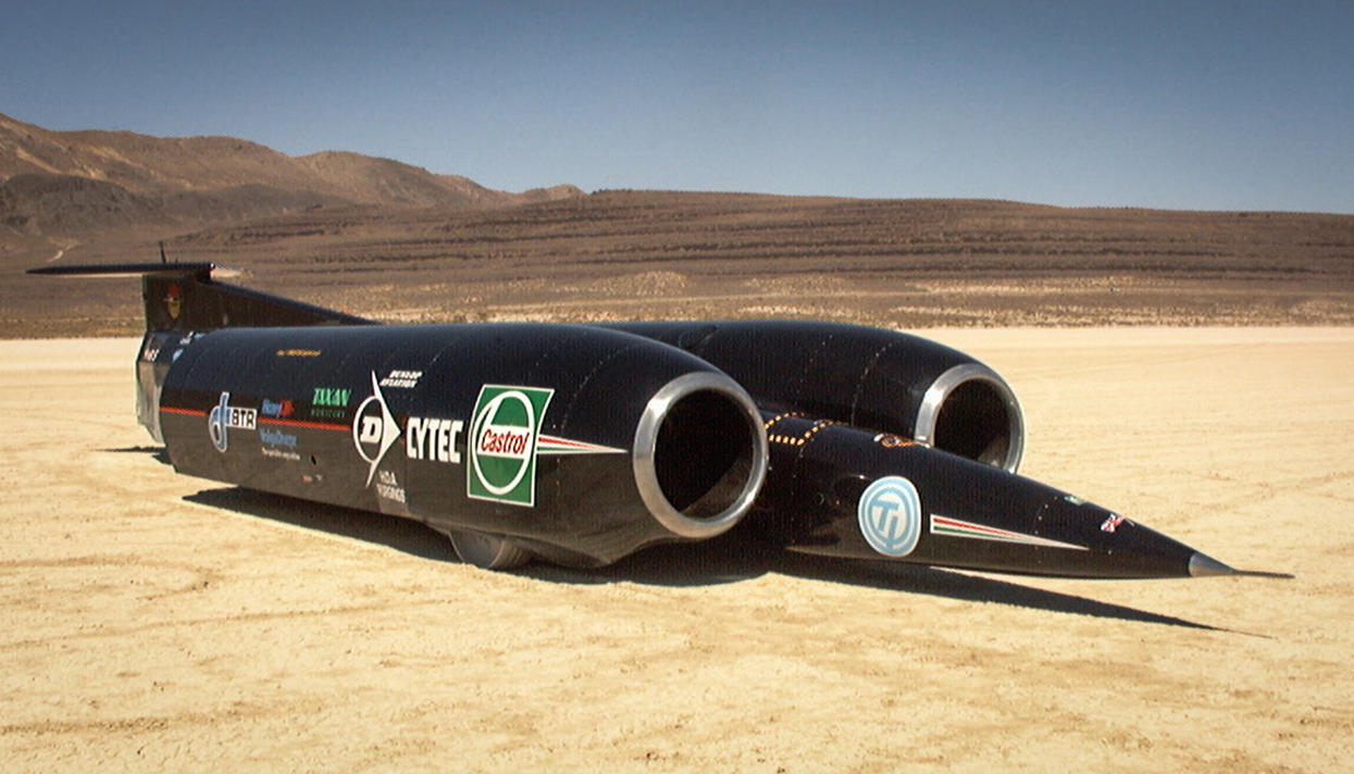 Земли большая скорость. Сверхзвуковой Thrust SSC. Реактивный автомобиль Thrust SSC. Thrust SSC (1228 км/ч ).. Thrust SSC 1997.