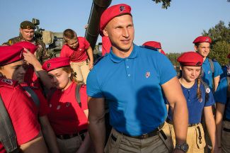 YouthArmy head and former bobsledder Dmitry Trunenkov (center) and a rally in “Patriot” park, August 18, 2017
