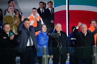 Vladislav Davankov, Leonid Slutsky, Vladimir Putin, and Nikolai Kharitonov at the rally concert. March 18, 2024. 