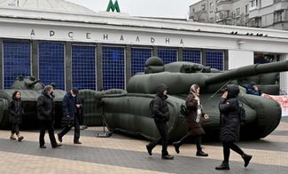 Inflated tanks displayed outside the Arsenalna subway station in Kyiv in a protest against the Ukrainian Defense Ministry’s failure to pay for a military order completed by a private firm. December 16, 2021.