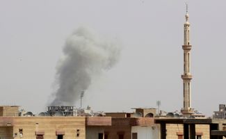 Последствия авиаудара по Ракке. 18 августа 2014 года 