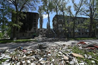 Жилой дом, поврежденный в результате российского обстрела