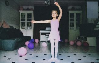 Alisa, age 7. Alisa has been practicing ballet since she was three years old. Now she has online classes twice a week and does ballet homework every day. At the beginning of April, Alisa had her birthday. She hopes that when the pandemic is over, she will be able to celebrate it with her friends at an adventure park.