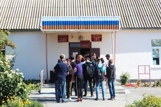 Voters at a polling station in Matveyev Kurgan 