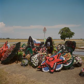July 26th 2022. Yeysk, Krasnodar Krai, Russia. Wreaths of flowers rest by the graves of recently killed Russian soldiers in a cemetery by the Yeysk Naval Aviation base. Yeysk is mainly a resort town and port situated on the shore of the Taganrog Gulf of the Sea of Azov.
