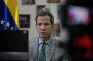 Лидер оппозиции Хуана Гуайдо на онлайн-встрече с членами старого парламента, избранного в 2015 году. Декабрь 2022 года