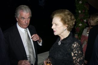 Lord Timothy Bell and Margaret Thatcher in London on September 17, 2002