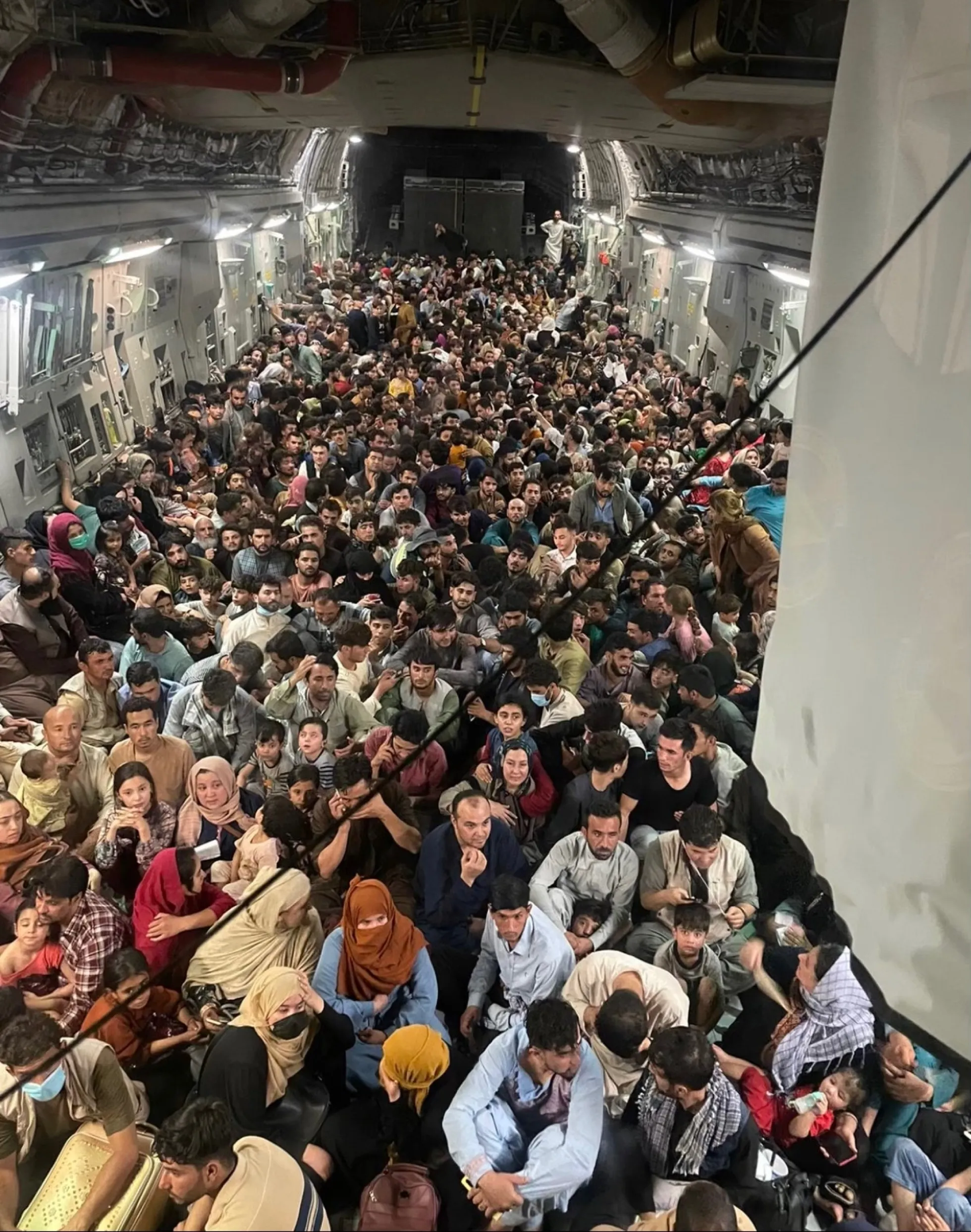 <a href="https://www.defenseone.com/policy/2021/08/inside-reach-871-us-c-17-packed-640-people-trying-escape-taliban/184563/" target="_blank">Obtained and verified by Defense One</a>