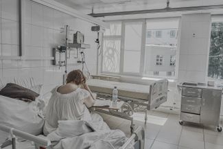 A female patient in the hospital’s “red zone”