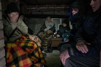 An overcrowded basement bomb shelter in the Kyiv region