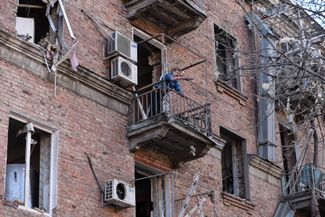 A resident of a house damaged by a Russian raid in the Dnieper, April 25, 2026