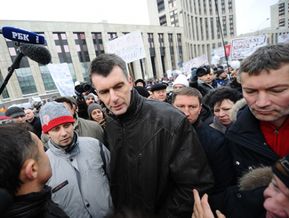 Presidential candidate and businessman Mikhail Prokhorov with Yevgeny Roizman, head of the foundation "Gorod Bez Narkotikov" (City without Drugs), at the opposition protest "For Fair Elections." Moscow, Sakharova Prospekt. December 26, 2011