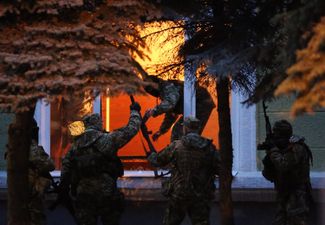 Russian troops capture the Kramatorsk city administration building. April 13, 2014.