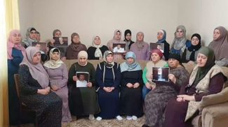 Bakhchysarai residents at a gathering in support of political prisoners. December 2022.