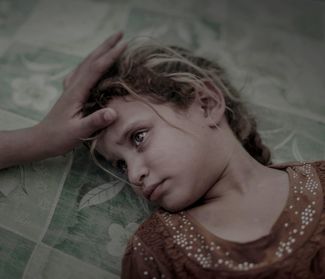 Категория «Люди», первое место в номинации «Отдельная фотография». Девочка из деревни под Мосулом. Ее семья бежала от боев и теперь живет в лагере беженцев<br>