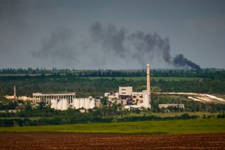 Smoke rising on the horizon is the front line, located a few kilometers from Slavyansk, May 22, 2026