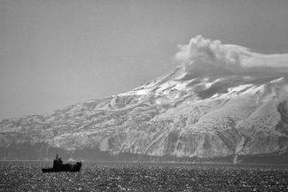 Fishing boat Number 49. Bogdan Khmelnitsky volcano. Iturup island. 