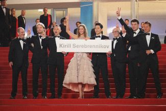 Cannes Film Festival president Pierre Lescure, producer Ilya Stewart, actors Roman Bilyk, Irina Starshenbaum, Theo Yu, and Cannes Film Festival director Thierry Frémaux, co-producer Charles-Evrard Chekhov and cinematographer Vladislav Opelyants call for the release of director Kirill Serebrennikov at the premiere of "Summertime" in Cannes. May 9, 2018.