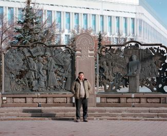 Aidar in front of an independence monument near the spot where he was injured. Almaty, 2022.