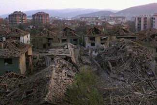 The aftermath of NATO bombing in the Yugoslavian city of Aleksinac. April 6, 1999.