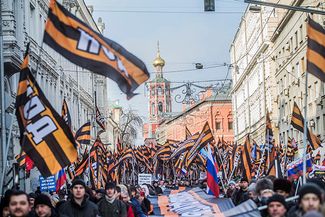 “Anti-Maidan” demonstrators march along Petrovka Street in Moscow