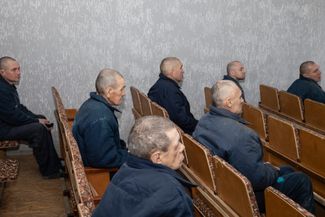 Russian prisoners in the recreation room. They can watch TV or read a book (in Ukrainian). A library and chess are also available to the prisoners, and there is a church on the colony’s grounds