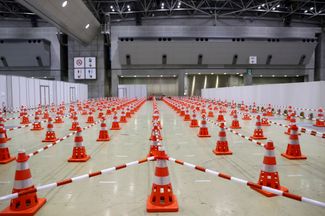 Помещение для тестирования на коронавирус в главном пресс-центре Олимпиады в Токио, 12 июля 2021 года.