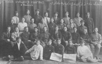 A group of Dungan students in Tashkent, Uzbekistan. The second student from the left in the second row is Dungan writer and activist Iasyr Shivaza. His granddaughter, Rahima Ismayeva, studies Dungan culture at the Kyrgyz Academy of Sciences. 1930s or 1940s.