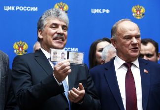 Communist Party presidential candidate Pavel Grudinin (left) and party chairman Gennady Zyuganov, after the former’s registration with Russia’s Central Election Commission in Moscow, January 12, 2018