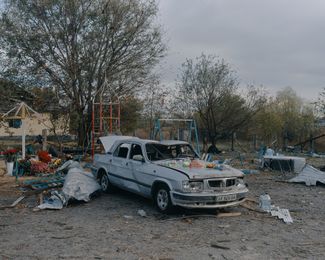 The Volga that belonged to the family of Andriy Kozyr, the soldier for whose burial Hroza residents were gathered on the day of the Russian missile strike, is still parked near the site of the strike