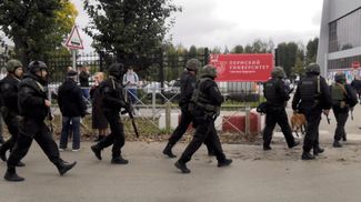 Police arriving at Perm State University, where the shooting took place