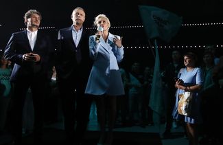 From left to right: human rights activist Alexander Khurudzhi, actor Sergey Zhigunov, and television host Tatyana Vinnitskaya at the New People electoral convention.