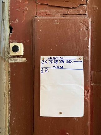 An elderly man living alone in Kharkiv marks the days on his apartment door so his neighbors know he’s still alive. May 3, 2022. 