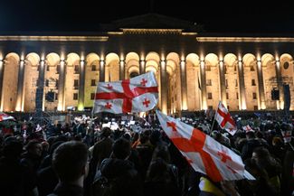 Georgian protesters hold a pro-E.U. rally outside of the parliament in Tbilisi after the government dropped its proposed “foreign agents” bill. March 9, 2023.