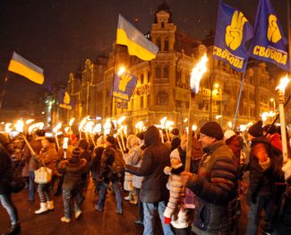 Марш украинских националистов в 107-ю годовщину со дня рождения Степана Бандеры. Киев, 1 января 2016 года