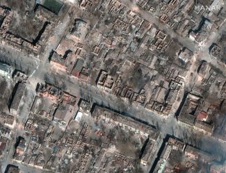 Спутниковое фото, на котором виден разрушенный Мариуполь