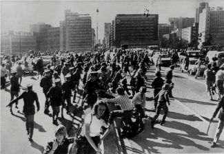 Students run from police in Johannesburg on June 17, 1976, as they protest authorities opening fire on students in Soweto.