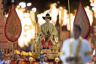 Thailand's King Maha Vajiralongkorn is carried on a palanquin through the streets outside the Grand Palace for the public to pay homage during the second day of his coronation ceremony in Bangkok. It’s the country’s first coronation in 70 years. May 5, 2019.