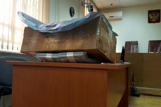 Представленные в суде купюры, обнаруженные в сумке, которую Сечин передал Улюкаеву