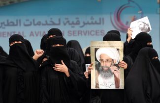 Саудовские женщины протестуют против казни богослова Нимра ан-Нимра, 2 января 2016 года<br>