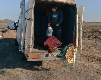 The burial of one of the victims of Russia’s attack on Hroza.