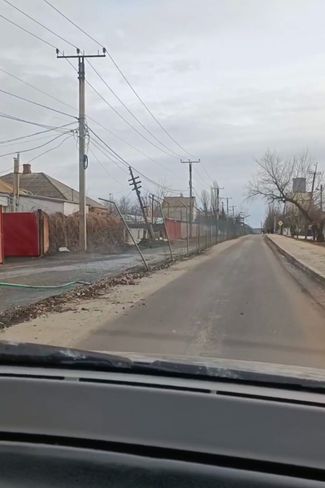 The remains of a destroyed fence on the Ukraine’s border with Russia. Screenshot from a video taken at the Milove–Chertkovo border crossing on February 24, 2022.