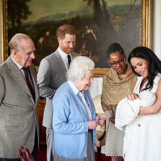 Britain's Prince Harry and his wife, Meghan, accompanied by Meghan's mother, Doria Ragland, show their newborn baby son, Archie Harrison Mountbatten-Windsor, to Queen Elizabeth II and Prince Philip at Windsor Castle. May 8, 2019.