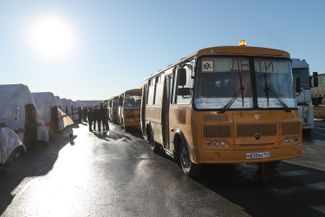 Buses at a camp for evacuees near the Matveyev Kurgan border checkpoint in Russia’s Rostov region