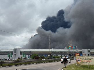 Smoke in the Mega Belaya Dacha shopping center area on June 18, 2026