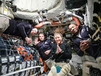 Artemis 2 crew, left to right: Canadian astronaut Jeremy Hansen, mission commander Reed Wiseman, and astronauts Christina Koch and Victor Glover during a video conference on April 2, 2026.