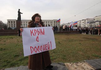 A rally in support of the unification referendum in Crimea. (Sign reads, “Crimea is with Russia!”)