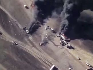 Автомобили, перевозящие нефтепродукты в Сирии, уничтоженные в результате авиаудара ВС РФ
