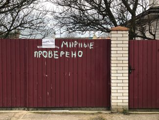 Russian soldiers left notes like this on dozens of private homes in Bohdanivka