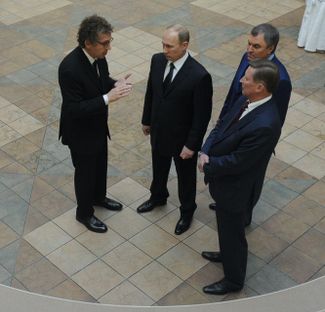 Left to right: Alexander Mamut, President Vladimir Putin, First Deputy Chief of Staff Vyacheslav Volodin, and Chief of Staff Sergey Ivanov before a seminar meeting on domestic policy issues outside Moscow on October 23, 2013.